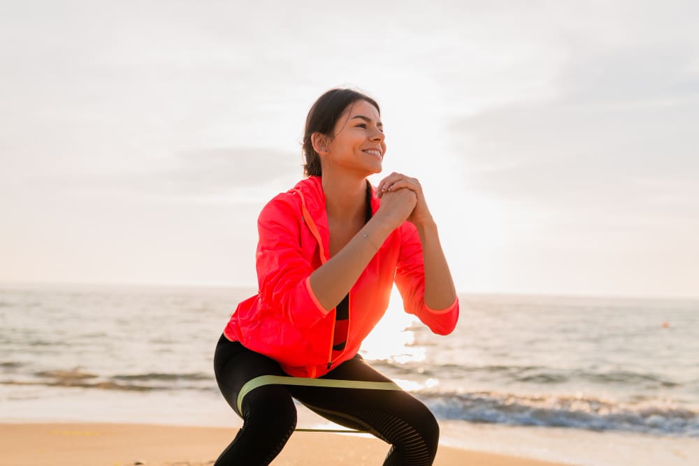 Image of a girl exercising with resistance bands